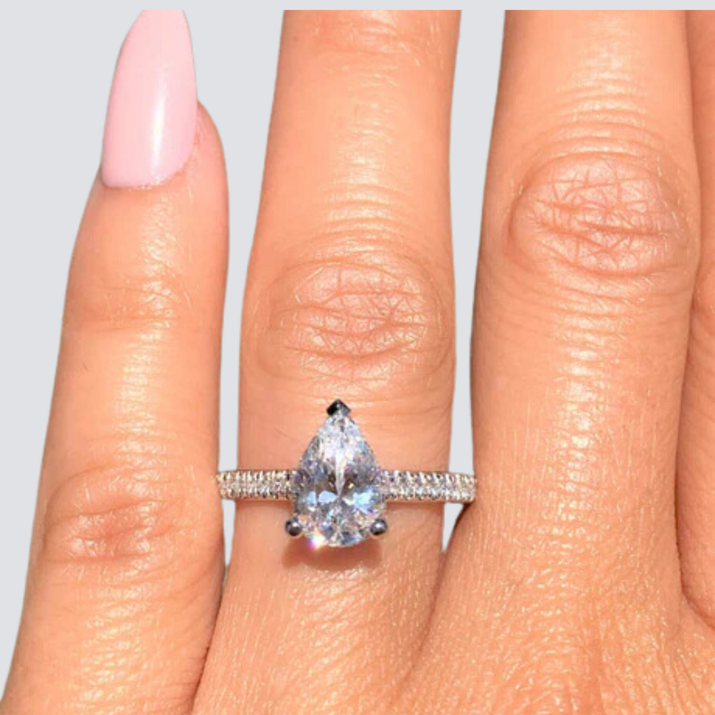 PEAR CUT DIAMOND RING | SILVER