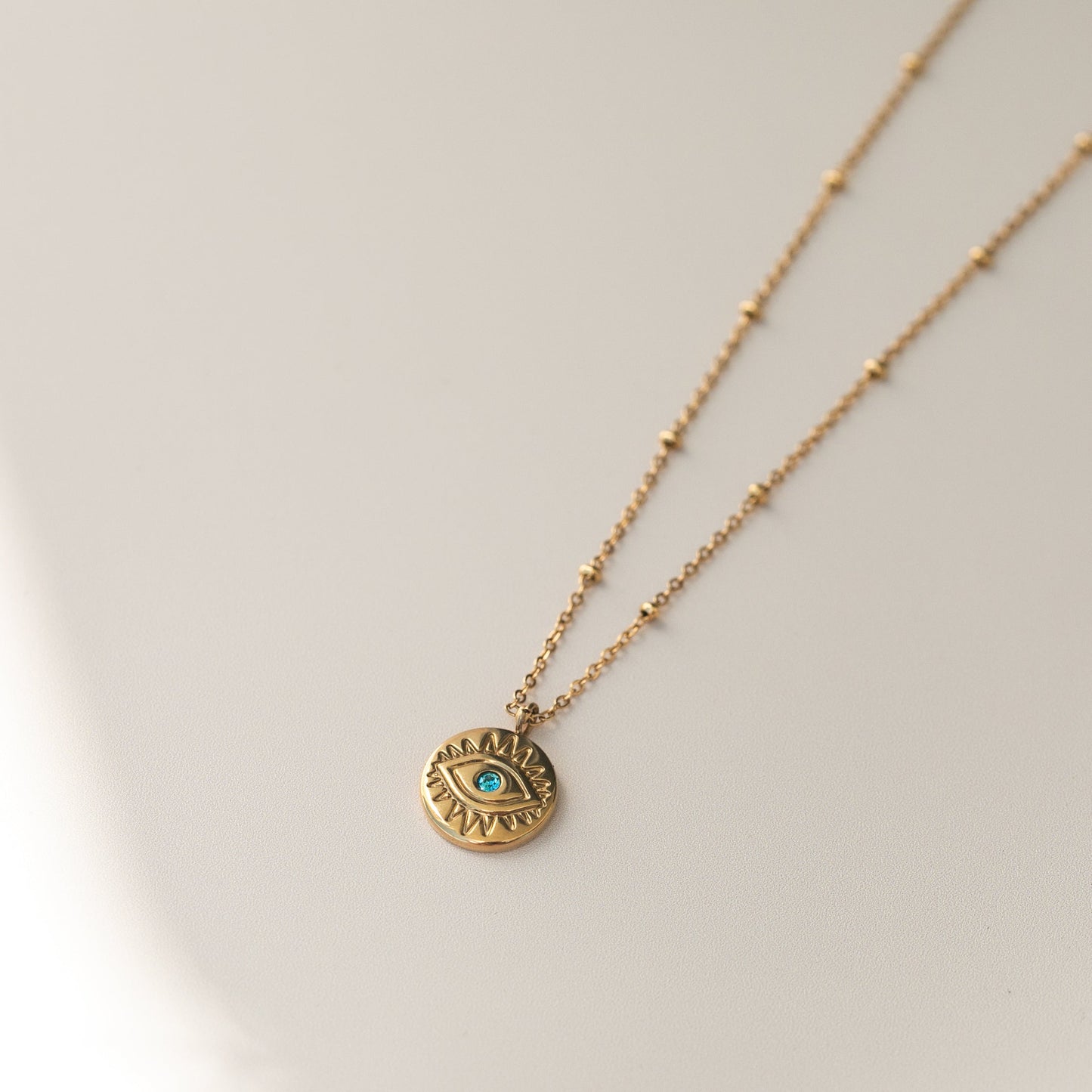 CELESTE EVIL EYE NECKLACE